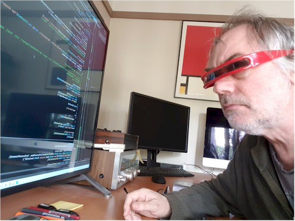 Greg working at his computer